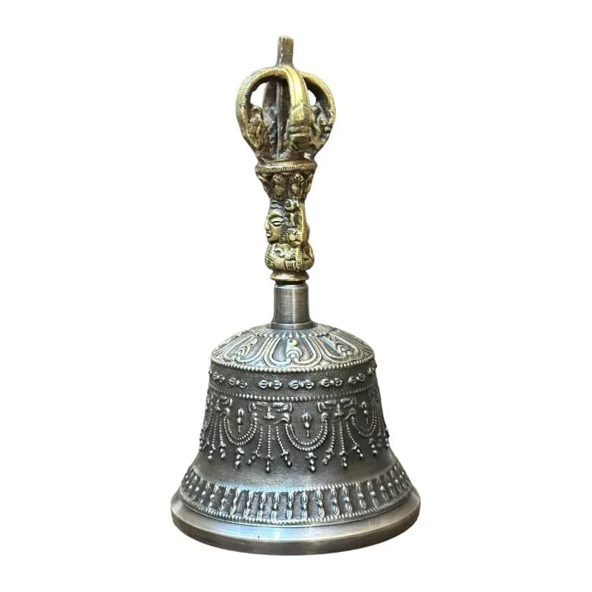 A bronze meditation bell with its ornate cast bajra handle